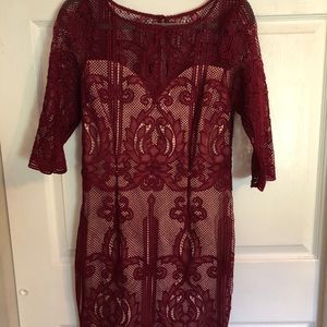 Wine red color dress.